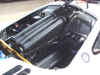 Picture of the BMW V-12 S70/2 engine compartment of a 1996 McLaren F1 GTR race car.